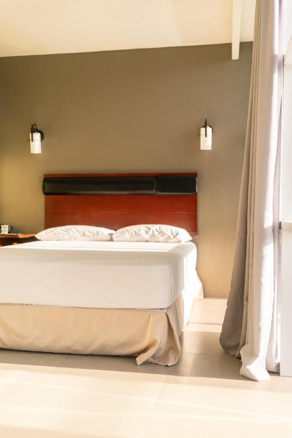 Dosi Hotel Ph ตาลิไซ ภายนอก รูปภาพ